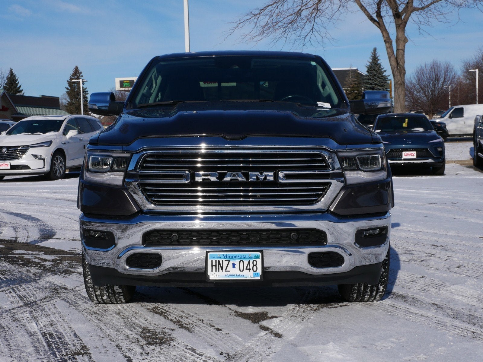 Used 2022 RAM Ram 1500 Pickup Laramie with VIN 1C6SRFJT9NN129785 for sale in Apple Valley, Minnesota
